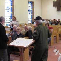 Welcoming crowd begins to gather.